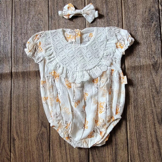 Vintage style bodysuit with head accessory